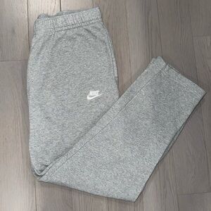 Light Grey “Nike Sportswear Club Fleece” men’s sweatpants in size large.